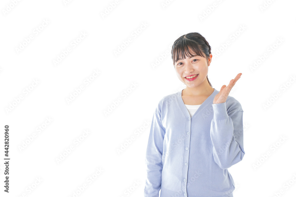 指を指す若い女性 指を指す若い女性