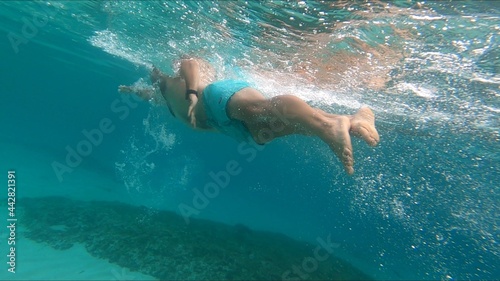 young man snorkeling in Menorca 