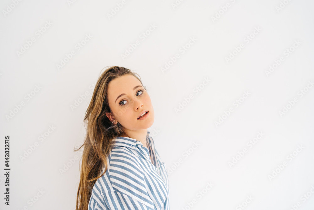 beautiful careless female with makeup looking at camera beautiful careless female with makeup looking at camera