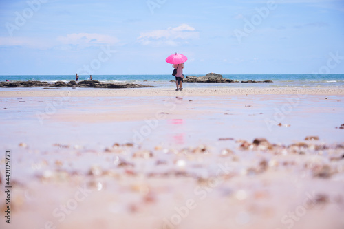 parent and child on the beach