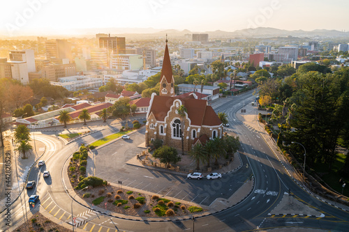 Historical landmark Christ Church aka Christuskirche at sunset in Windhoek, the capital and largest city of Namibia. photo