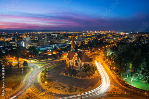 Historical landmark Christ Church aka Christuskirche at dusk in Windhoek, the capital and largest city of Namibia.