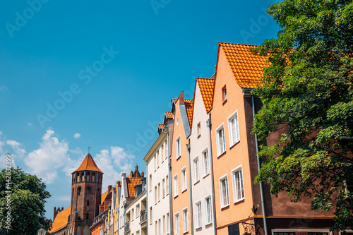 St. Nicholas Roman Catholic Church and old town street in Gdansk, Poland