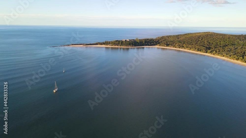 Boats Sailing At South Pacific Ocean Near Trial Bay Gaol Beach - Laggers Point Headland In Arakoon, South West Rocks In Kempsey Shire, New South Wales, Australia. - aerial photo