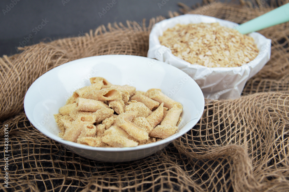 Malaysian Kuih Raya called Crunchy Popia Nestum. Popular kuih raya on Hari Raya Aidilfitri in Malaysia. Selective focus. Malaysian Kuih Raya called Crunchy Popia Nestum. Popular kuih raya on Hari Raya Aidilfitri in Malaysia. Selective focus.