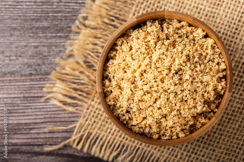 Bowl with Brazilian farofa. Made with manioc flour. photo