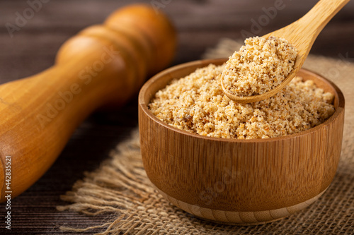 Bowl with Brazilian farofa. Made with manioc flour.