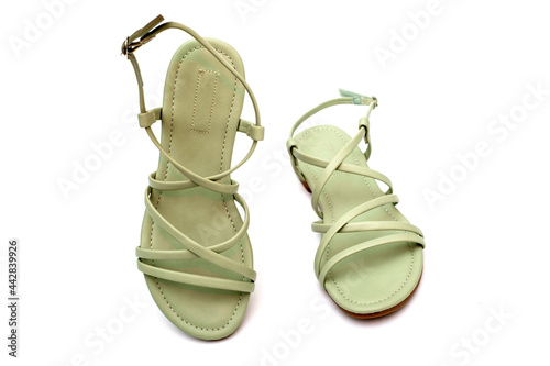 Women's summer sandals on a white background, top view photo