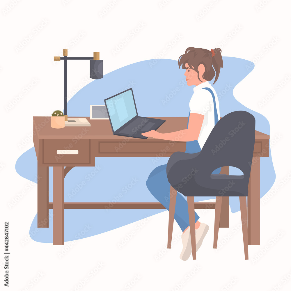 young woman freelancer sitting at workplace using laptop coronavirus quarantine freelance concept