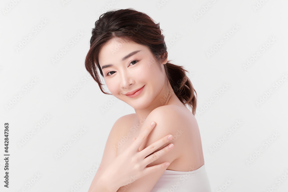 Obraz premium Beautiful young asian woman with clean fresh skin on white background, Face care, Facial treatment, Cosmetology, beauty and spa, Asian women portrait.
