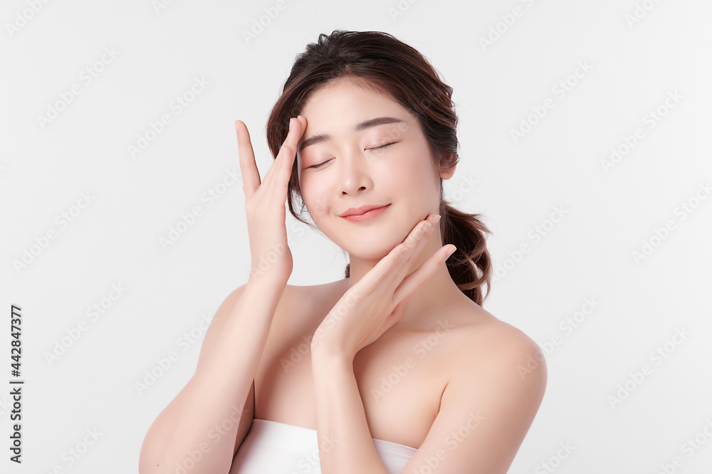 Beautiful young asian woman with clean fresh skin on white background, Face care, Facial treatment, Cosmetology, beauty and spa, Asian women portrait. Beautiful young asian woman with clean fresh skin on white background, Face care, Facial treatment, Cosmetology, beauty and spa, Asian women portrait.