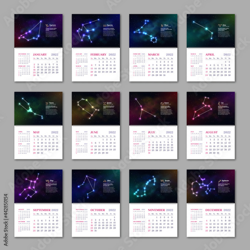 12 month of year wall zodiac calendar template set. 2022 week starts Sunday calendar scheduler, planner, stationery organizer with glowing zodiac constellations on dark blue starry background
