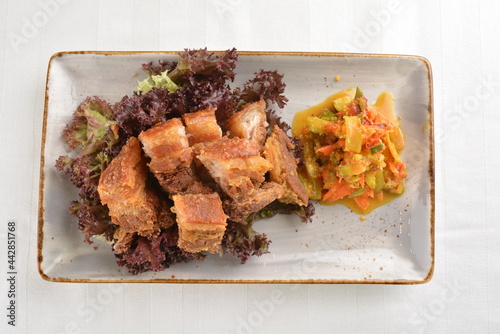 deep fried crispy pork belly crawling with nonya achar salad asian roasted menu photo