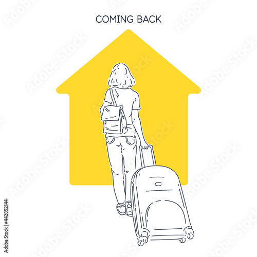 A girl with a suitcase returns home after a trip. The young woman reached her destination.