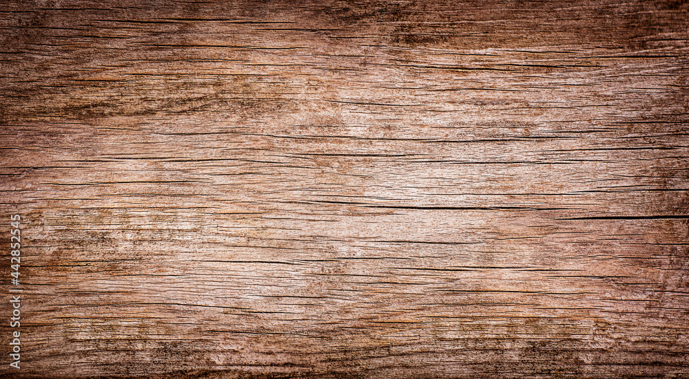 Naklejka premium background of old wooden board with cracks