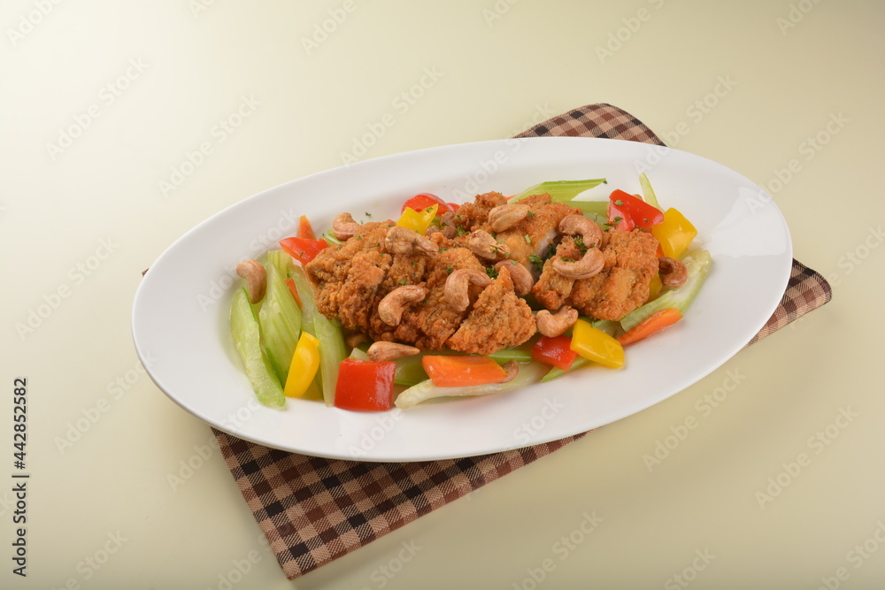 deep fried chicken cutlet chop with cashew nut and vegetables main course asian halal menu deep fried chicken cutlet chop with cashew nut and vegetables main course asian halal menu