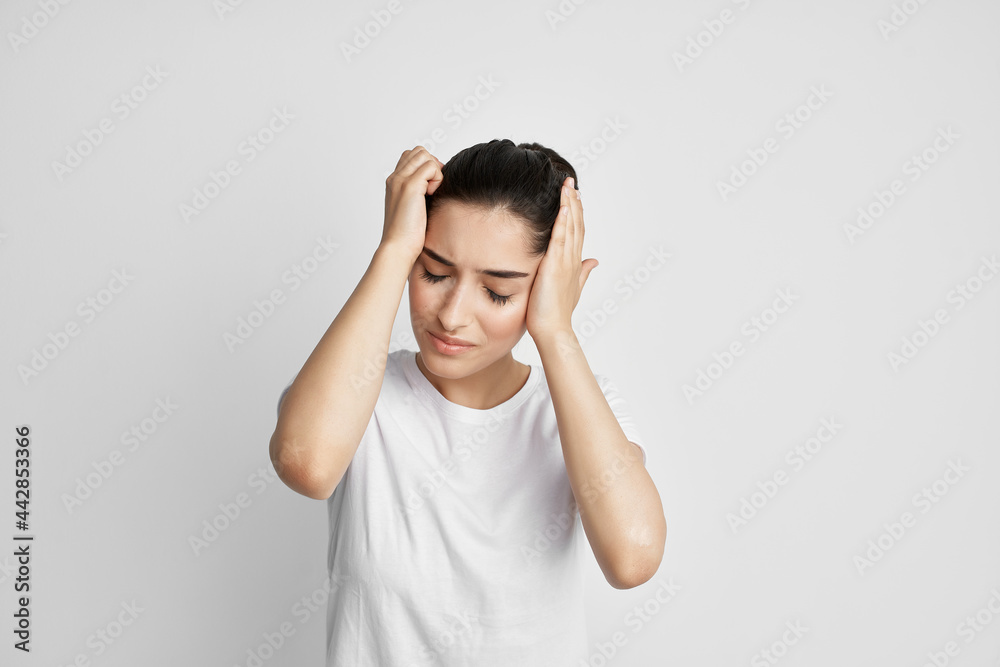 woman with headache holding her head migraine treatment health problem woman with headache holding her head migraine treatment health problem