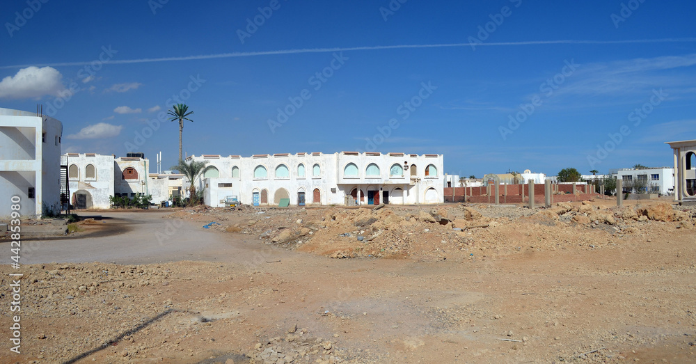 Residential non tourist area. White apartment buildings. Sharm El Sheikh, Egypt 