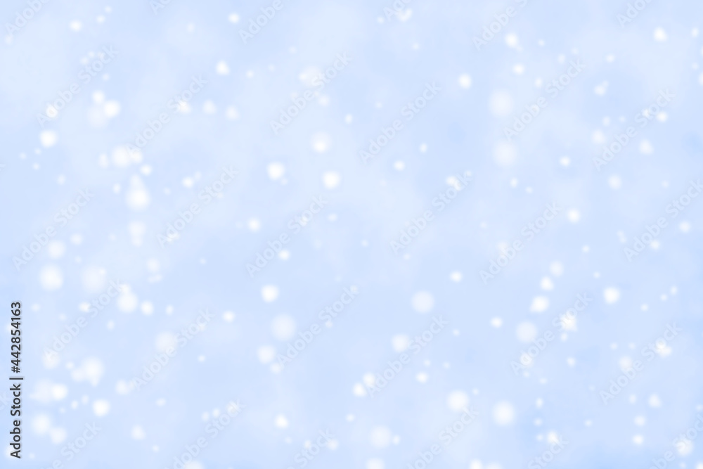 Abstract snowfall background.  Blurred blue and white snowfall background. 