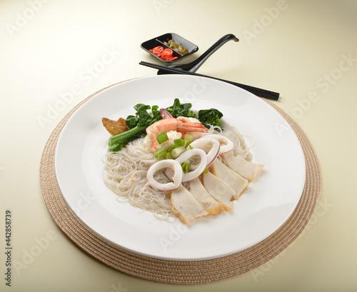 stir fried dry bee hoon mee noodle with mixed seafood lala shell and prawn asian halal menu photo