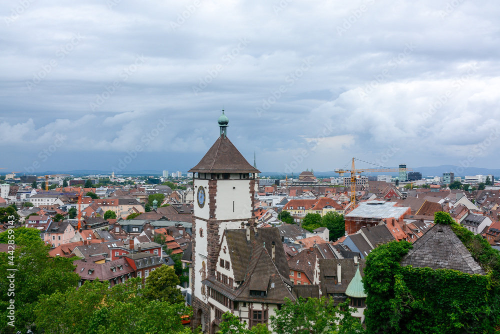 Freiburg im Breisgau, June 29, 2021: A storm front forms over the Rhine Valley and the city of Freiburg with a view of the Schwabentor.