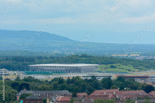 Freiburg im Breisgau, June 29, 2021: The Rhine Valley with the new SC Freiburg stadium and a cloudy sky just before a violent thunderstorm. photo