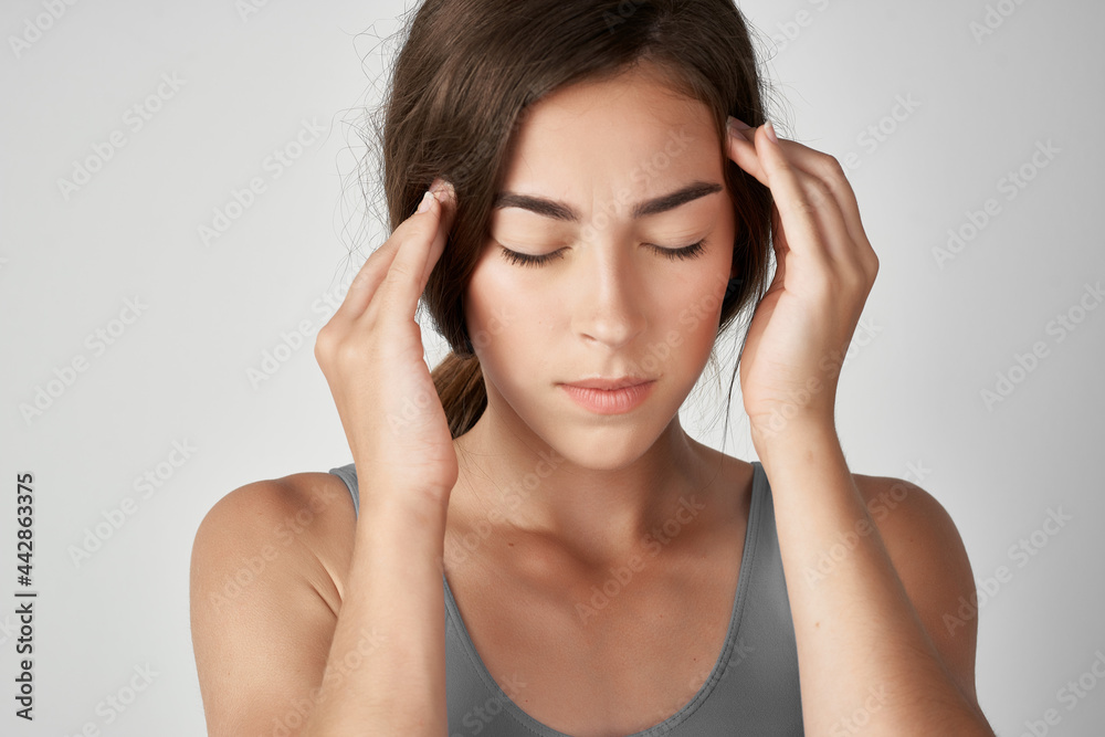 woman holding her head depression migraine discontent pain woman holding her head depression migraine discontent pain