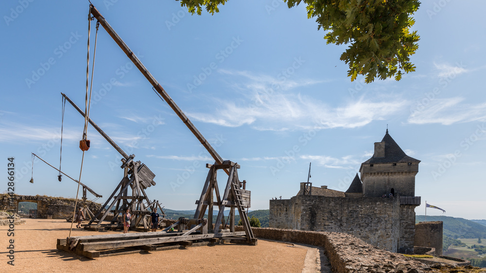 Medieval catapult in Castelnaud-la-Chapelle Castle in France Medieval catapult in Castelnaud-la-Chapelle Castle in France