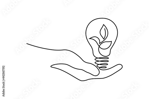 Green energy icon in continuous line art drawing style. Human hand holding light bulb with plant inside as a symbol of environmental friendly sources of energy black linear design on white background
