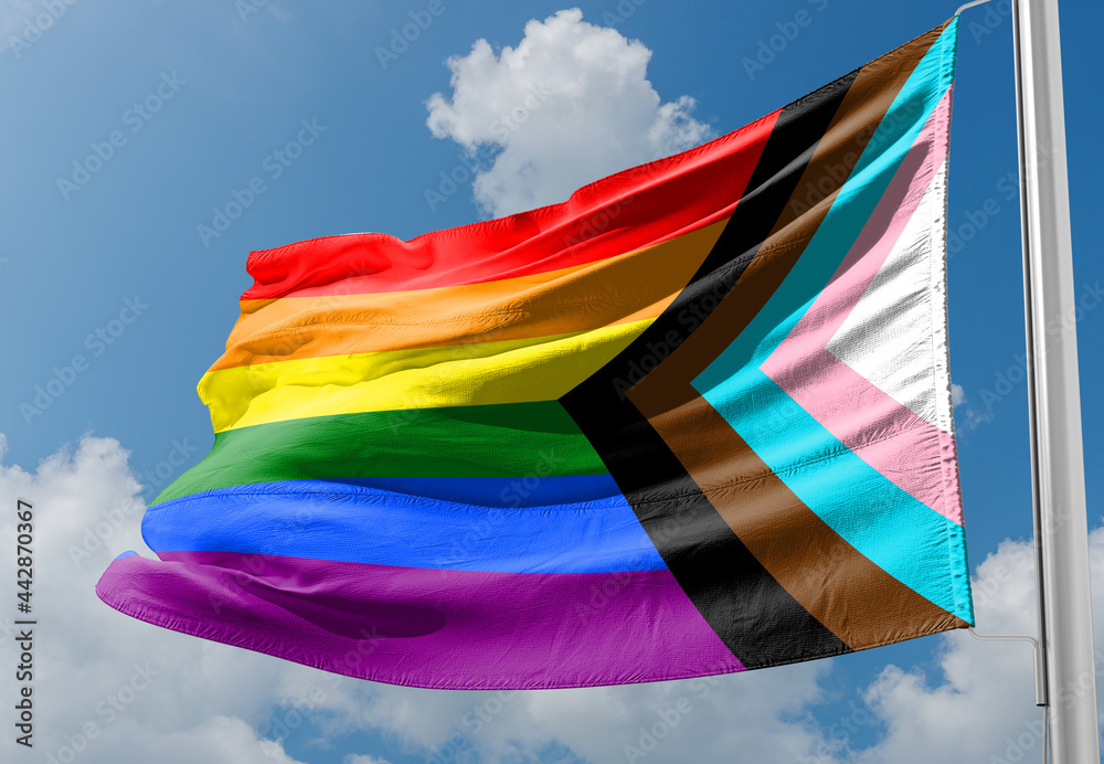 Progress LGBTQ rainbow flag waving in the wind at cloudy sky. Freedom ...