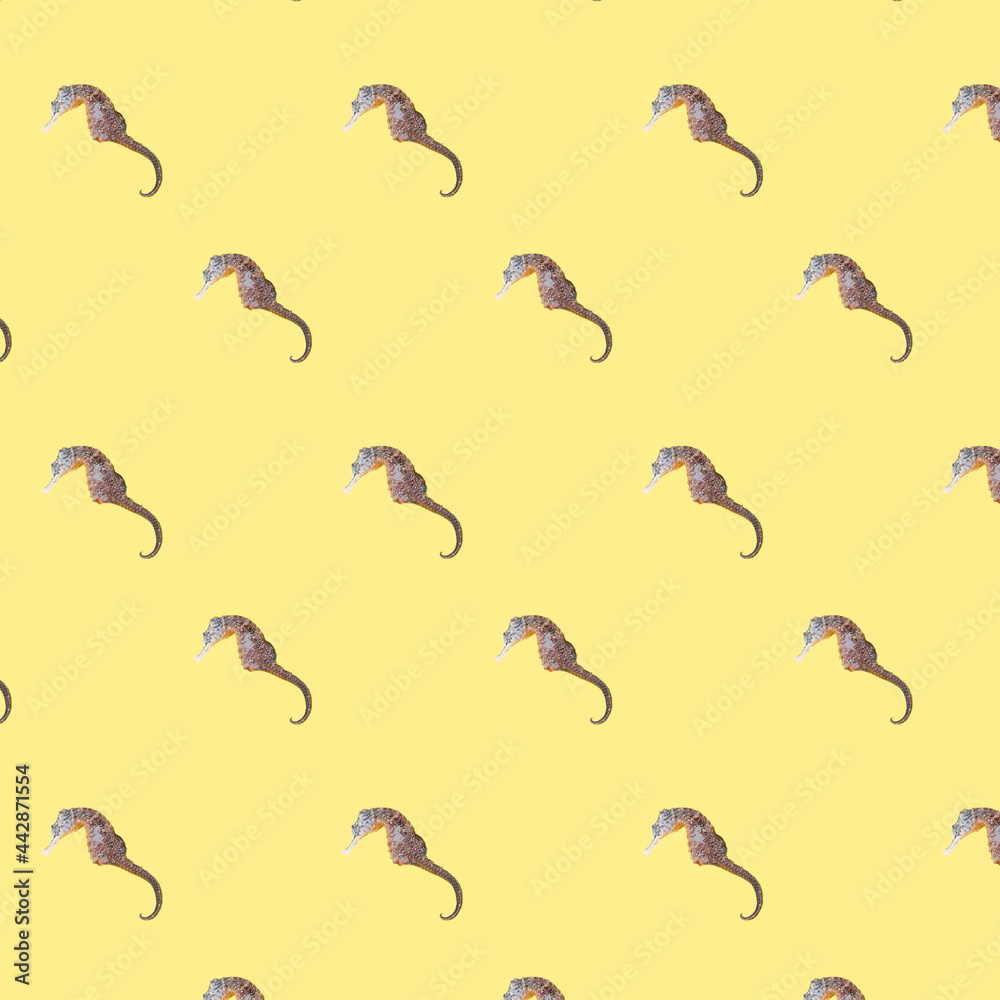 Obraz premium Colorful cotton fabric with fish pattern on yellow for background or texture