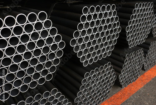 Steel round pipe packaging in factory.