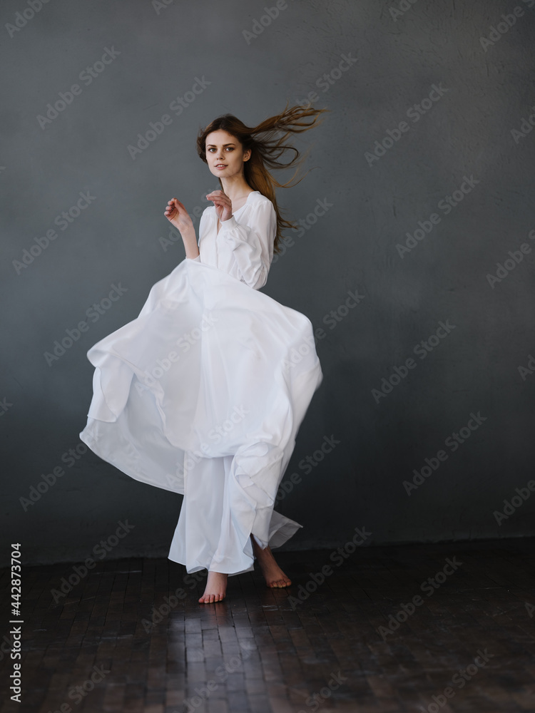 Woman in white luxury dress posing fashion Woman in white luxury dress posing fashion