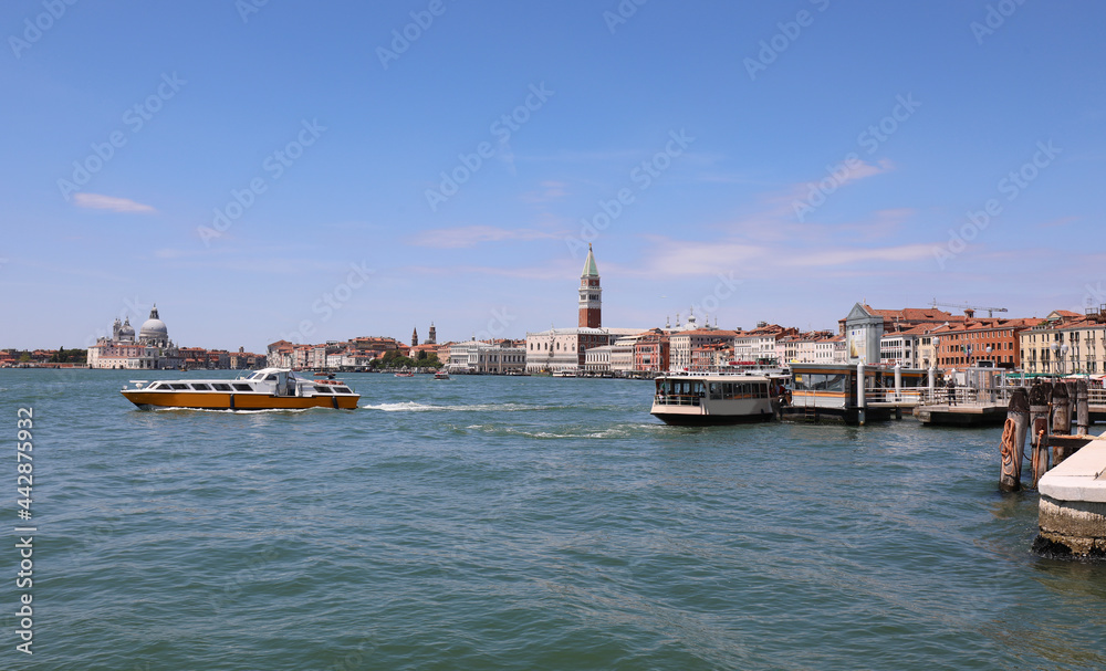 few boats sailing in the Venice lagoon in Italy due to the tremendous locktown caused by the coronavirus