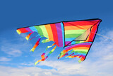 kite with bright colors that flies high in the sky symbol of freedom and carefree