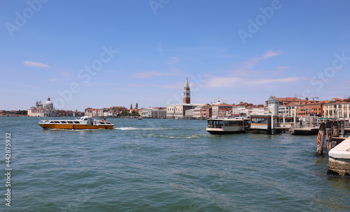 few boats sailing in the Venice lagoon in Italy due to the tremendous locktown caused by the coronavirus