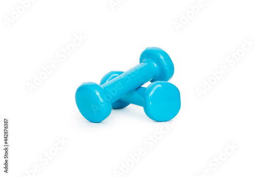 Blue dumbbells on a white background. Isolated sports tool. Female fitness, gym. Sports for women and girls