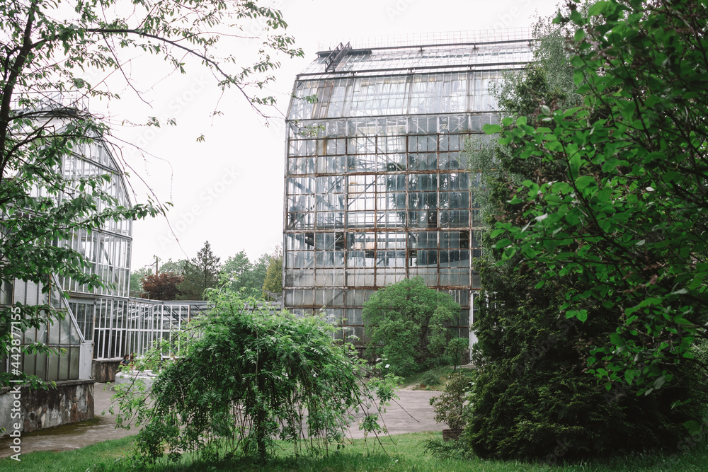Large glass greenhouse in a botanical gaden in Lviv, Ukraine