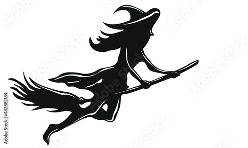 black witch sihouette on broom