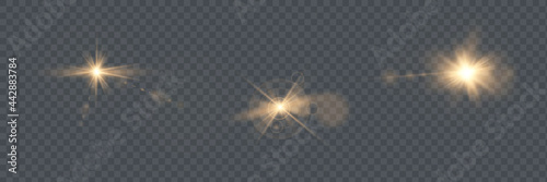 Set. Shining star, the sun particles and sparks with a highlight effect, golden bokeh lights glitter and sequins. On a dark background transparent. Vector,