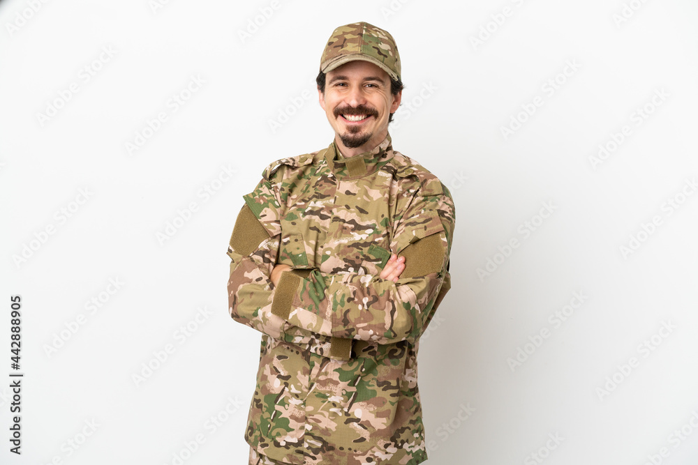 Soldier man isolated on white background keeping the arms crossed in frontal position Soldier man isolated on white background keeping the arms crossed in frontal position