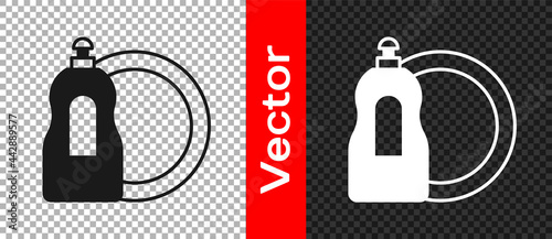 Black Dishwashing liquid bottle and plate icon isolated on transparent background. Liquid detergent for washing dishes. Vector