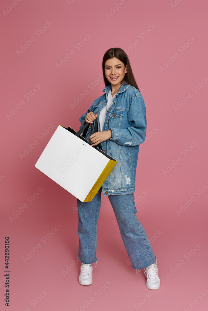 beautiful woman holding shopping bags with purchases beautiful woman holding shopping bags with purchases
