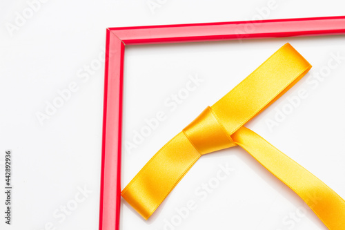 Coloured frames and a gift ribbon