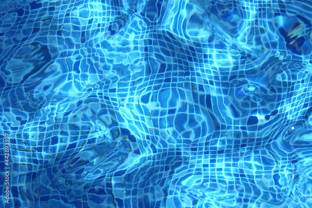 Bottom of a pool seen through the water Bottom of a pool seen through the water