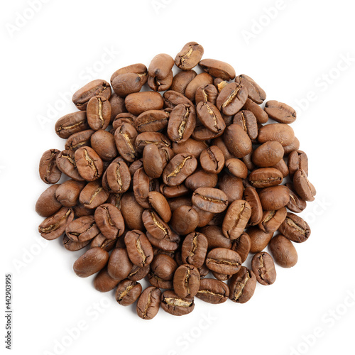 Heap of roasted coffee beans isolated on white, top view