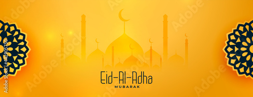 beautiful eid al adha yellow decorative banner