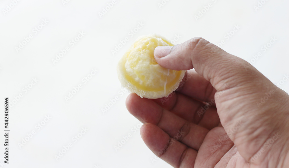 Close up of hand holding dessert Close up of hand holding dessert