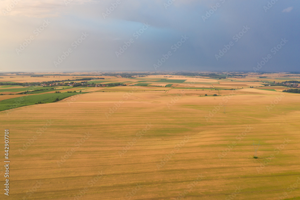 Storm in the countryside. Village from drone aerial view. Beautiful village with houses and fields in Nysa, Poland. Polish farmland