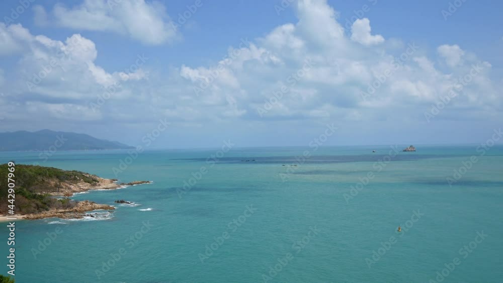 Tropical beautiful landscape of sea ocean around sand with white cloud blue sky for nature background
Tropical beautiful landscape of sea ocean around sand with white cloud blue sky for nature background